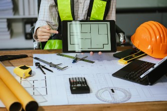 architect-construction-engineer-plan-on-hard-proje-2024-06-05-22-05-40-utc