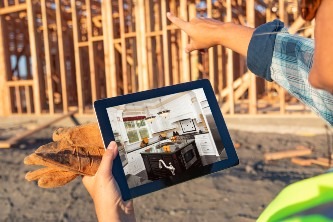 female-construction-worker-reviewing-kitchen-on-co-2024-09-11-14-27-21-utc